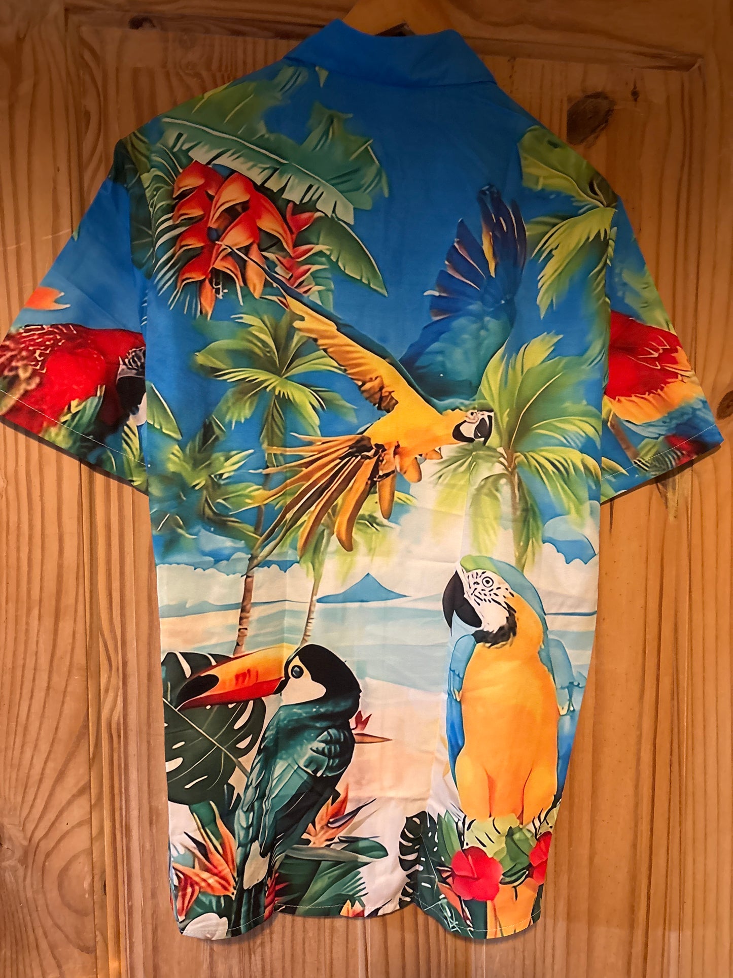 Quel joli garçon alors cette chemise hawaïenne de merde